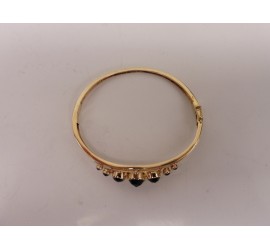 Gouden slavenarmband met granaat