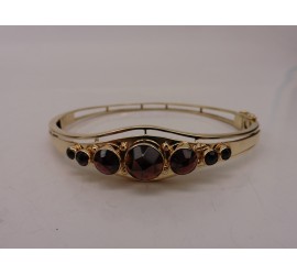 Gouden slavenarmband met granaat