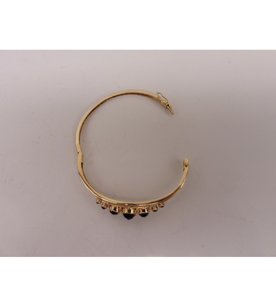 Gouden slavenarmband met granaat