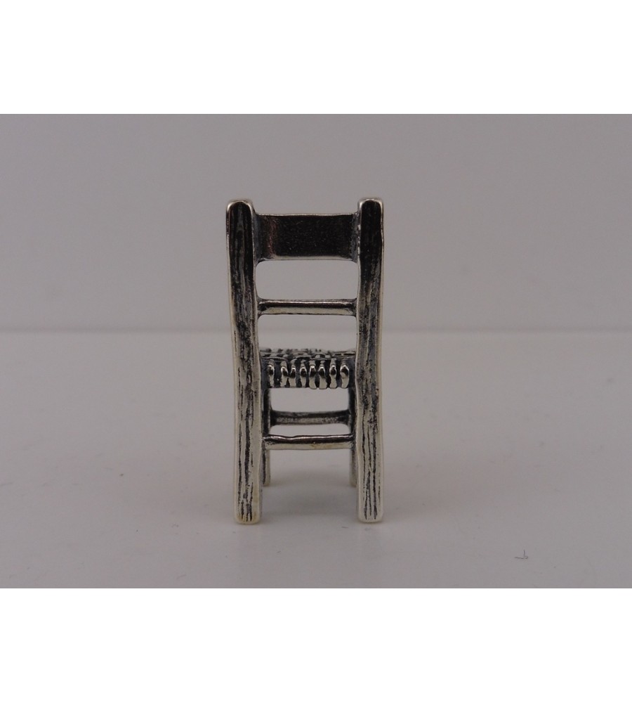 Zilveren miniatuur stoel