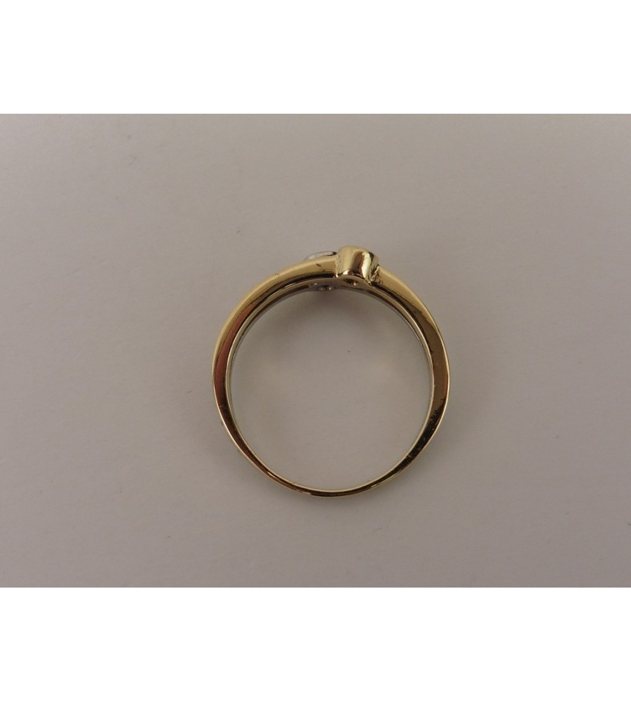 Gouden bi-color damesring met briljant