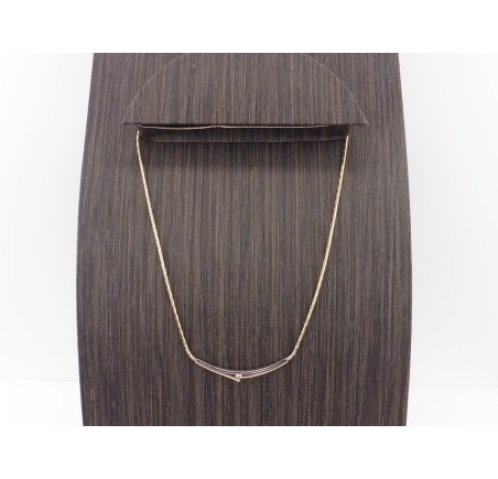 Gouden choker met briljant