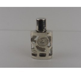 Parfumflesje in zilveren huls