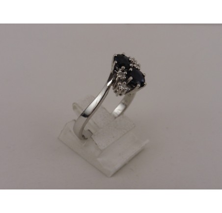 Witgouden damesring met briljant en blauw saffier