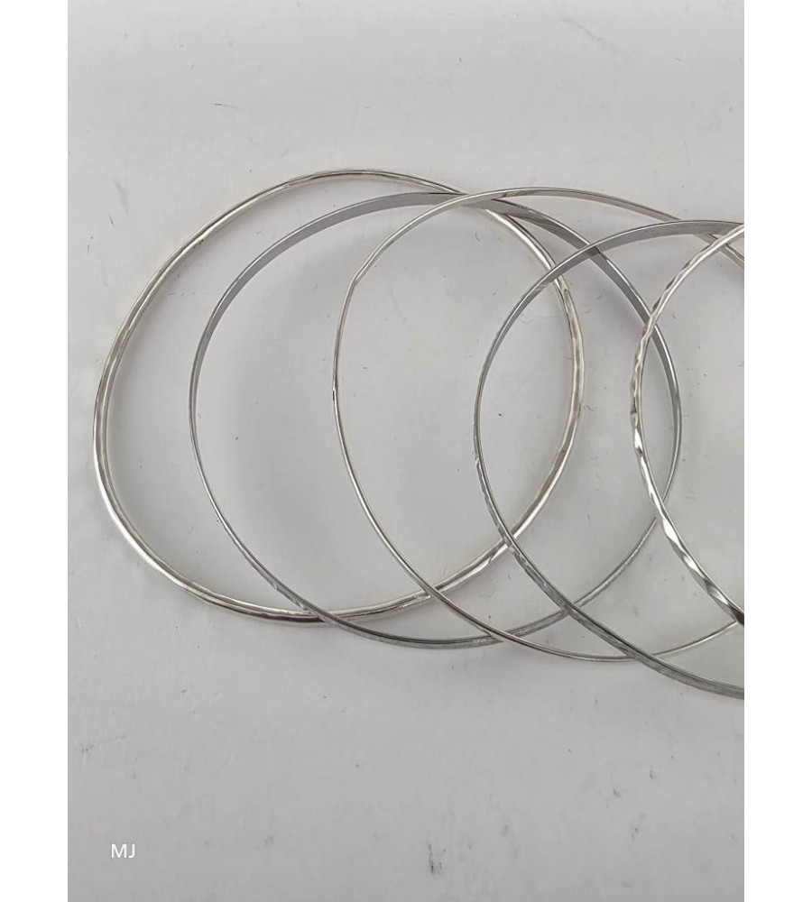 7 Zilveren rinkelarmbanden