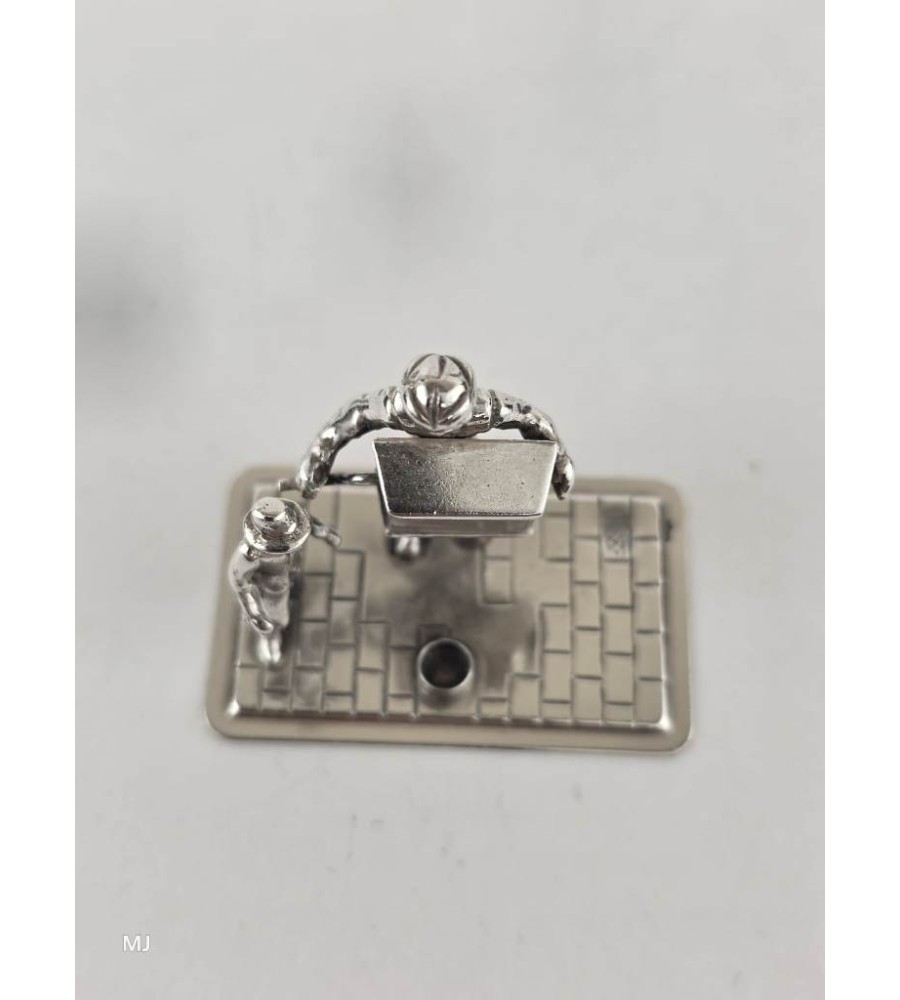 Zilveren miniatuur Straatmuzikant