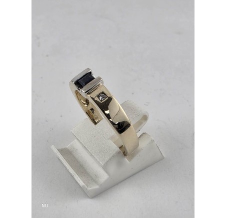 Gouden damesring met blauw saffier en briljant