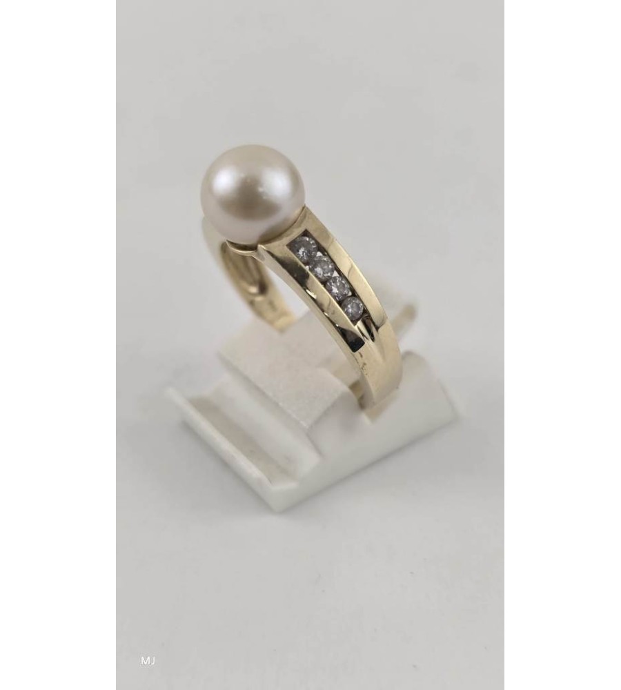 Gouden damesring met parel en zirkonia