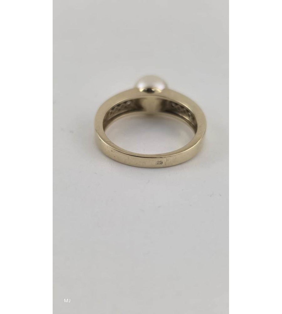 Gouden damesring met parel en zirkonia